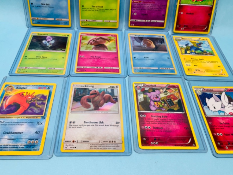 Photo 4 of 803252…12 Pokémon trading cards some holo in hard plastic sleeves 