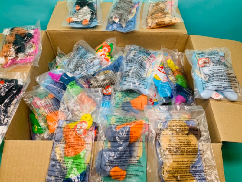 Photo 1 of 803264…70 vintage McDonald’s beanie babies toys in packages. 9 varieties total with many doubles and triples 