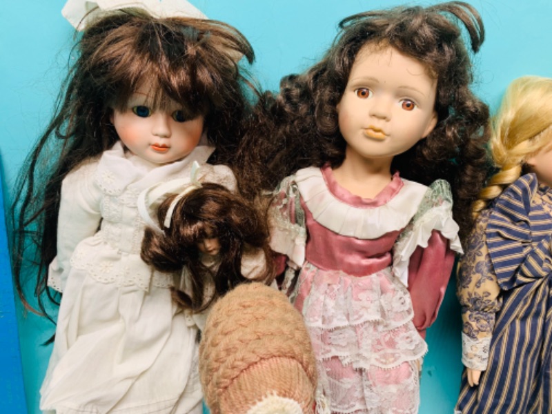 Photo 5 of 803280…vintage dolls- most porcelain- some broken feet and dusty