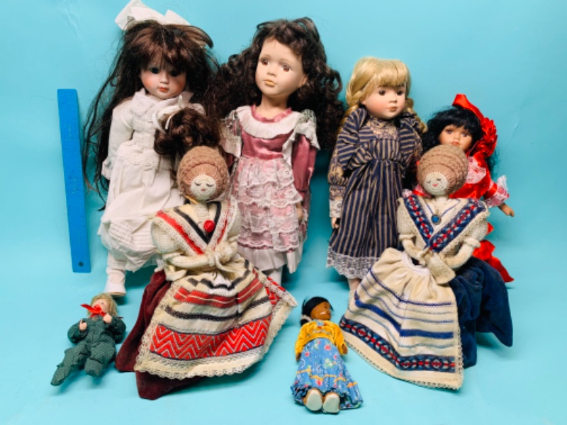 Photo 1 of 803280…vintage dolls- most porcelain- some broken feet and dusty