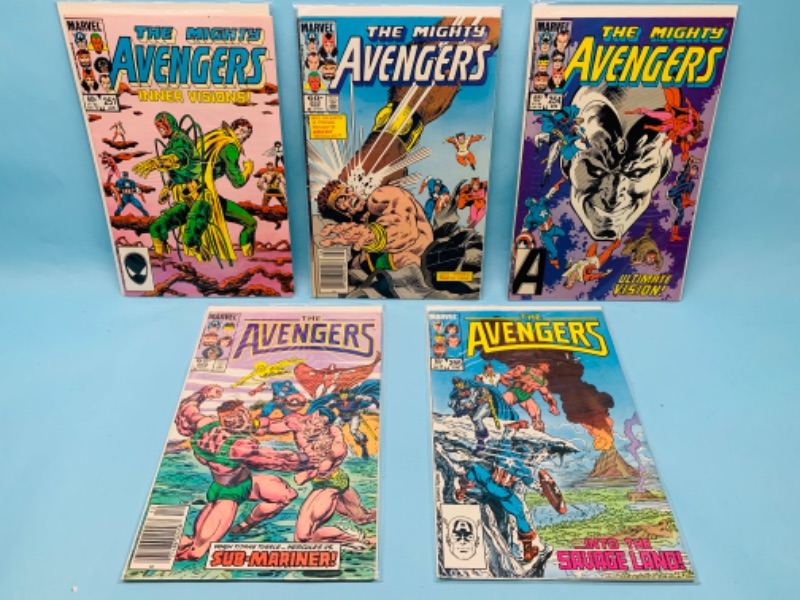 Photo 1 of 803383…vintage $.65 and $.60 cent comics in plastic sleeves 