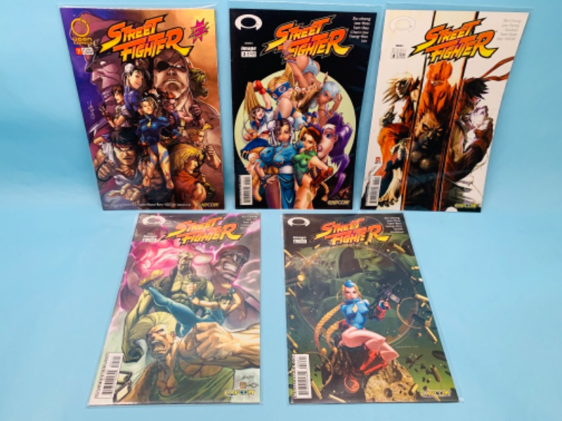 Photo 1 of 803387…5 street fighter comics in plastic sleeves 