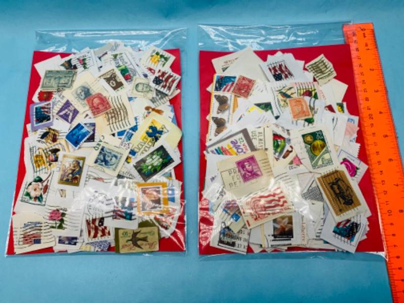 Photo 1 of 803417…hundreds of used stamps- see photos 