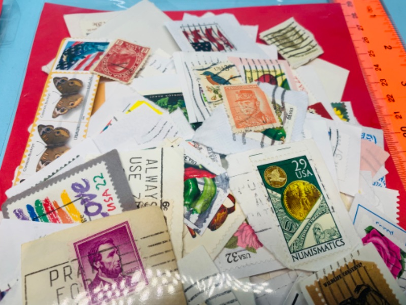 Photo 1 of 803417…hundreds of used stamps- see photos 