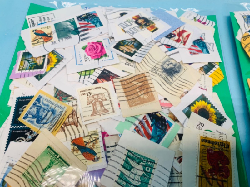 Photo 2 of 803418…hundreds of used stamps- see photos 