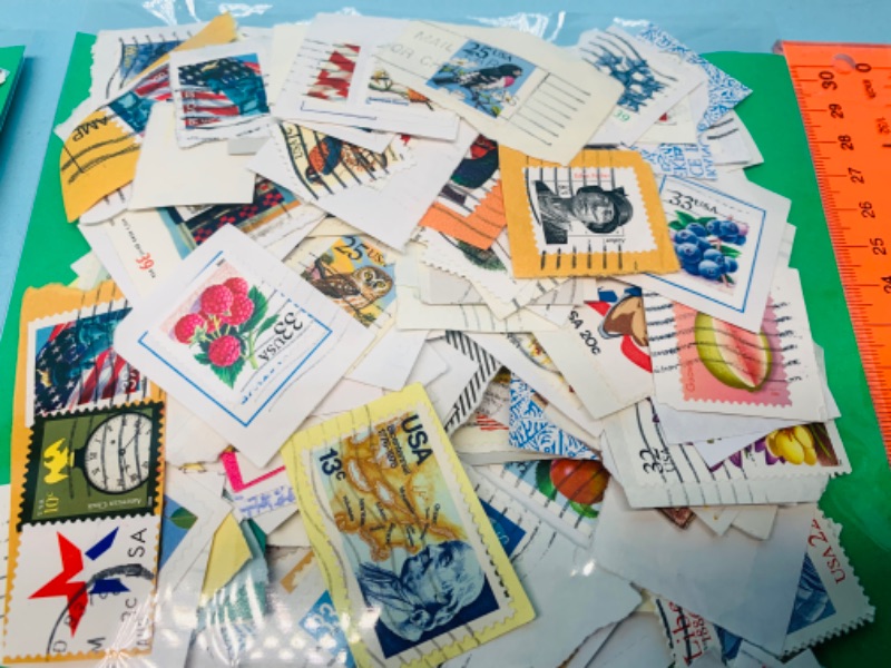 Photo 1 of 803418…hundreds of used stamps- see photos 