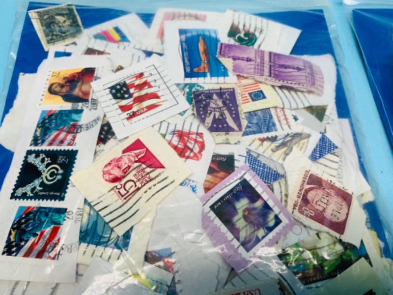 Photo 4 of 803419…hundreds of used stamps -see photos 