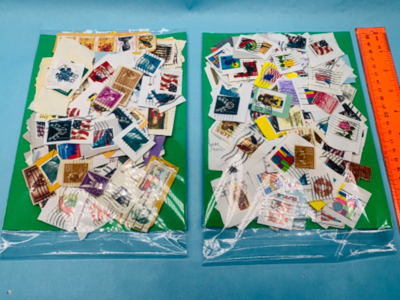Photo 1 of 803421…hundreds of used stamps -see photos 