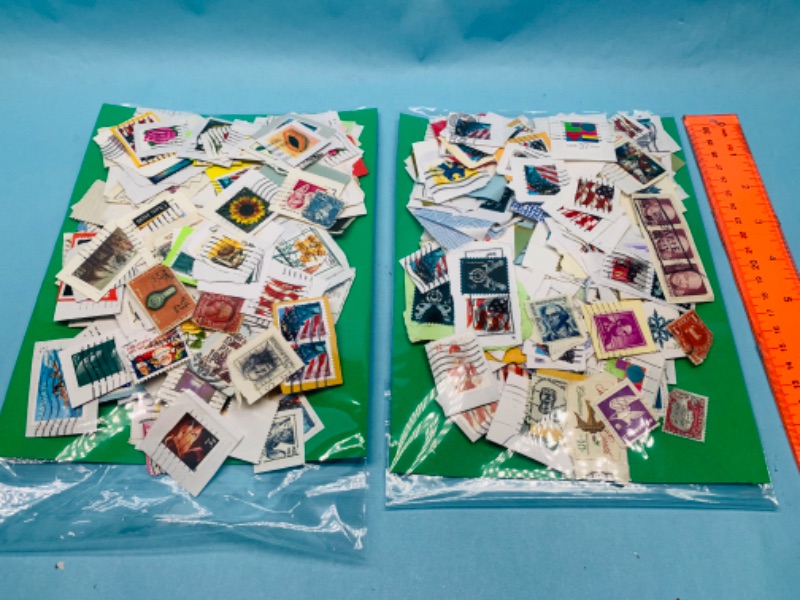 Photo 1 of 803422…hundreds of used stamps -see photos 