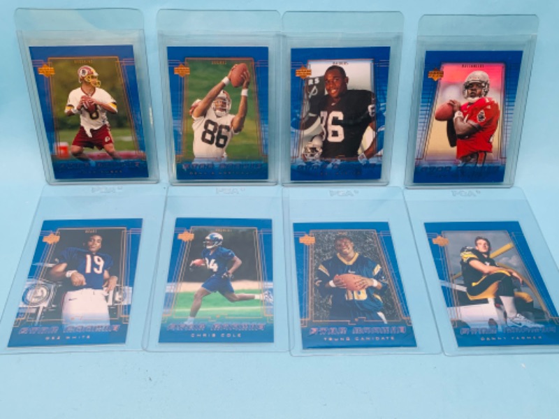 Photo 1 of 803440…8 upper deck football Star rookie cards in hard plastic sleeves 