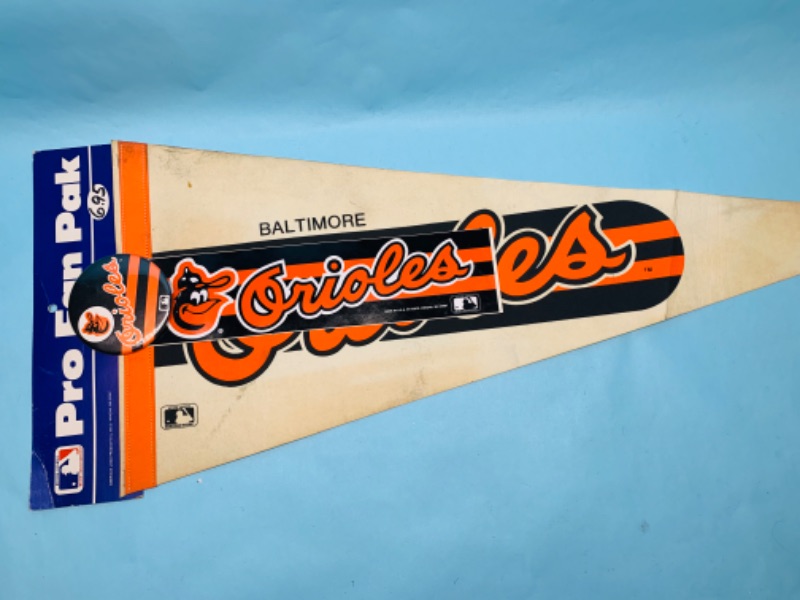 Photo 1 of 803449…vintage pro fan pak Baltimore orioles pennant, pin, and bumper sticker- stains and bent