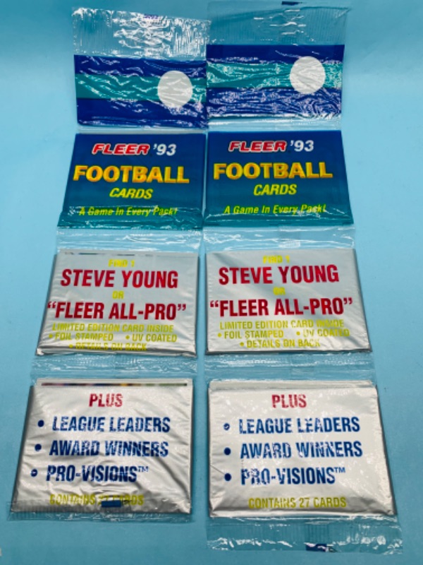 Photo 1 of 803453…2 sealed fleer 1993 football rack packs 27 cards in each 