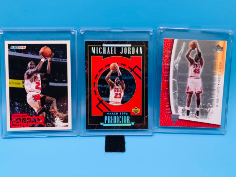 Photo 1 of 803478…3 Michael Jordan trading cards in hard plastic cases