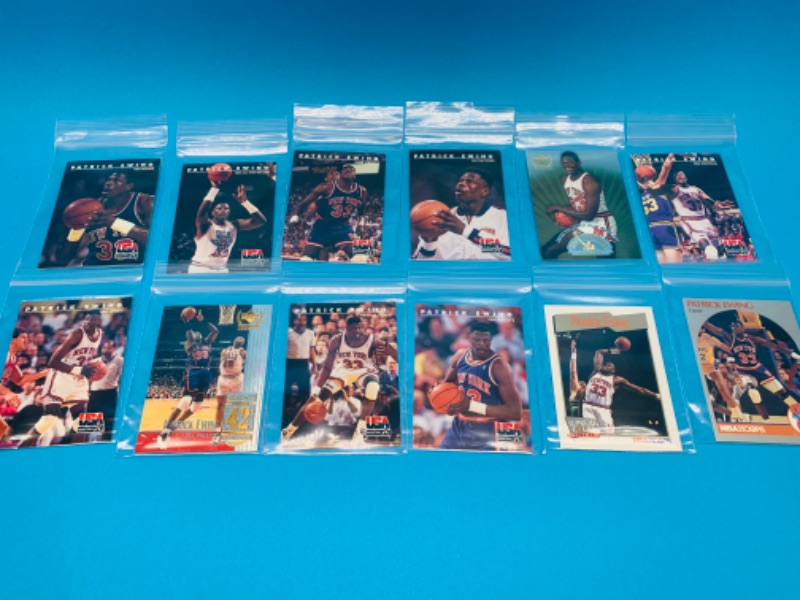 Photo 1 of 803597…12 Patrick Ewing trading cards in plastic sleeves 