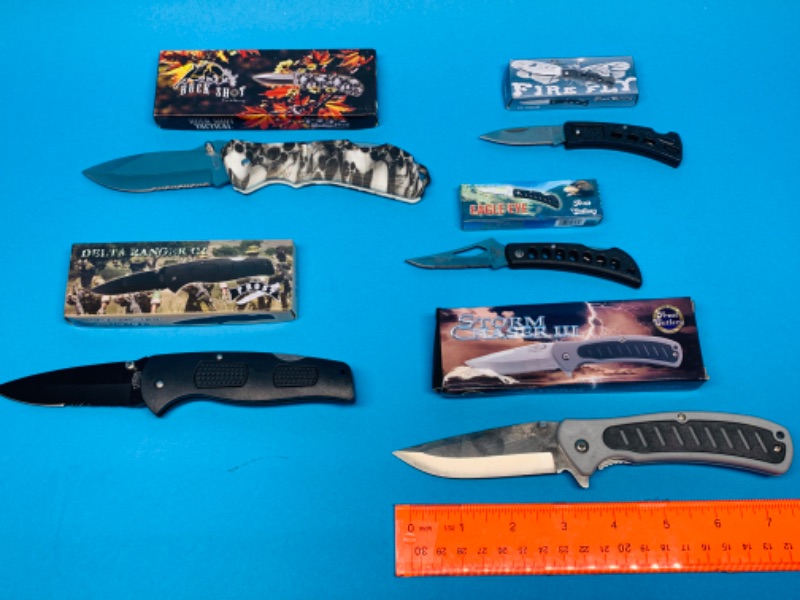Photo 1 of 803804…5 folding knives in boxes-  frost and buck shot