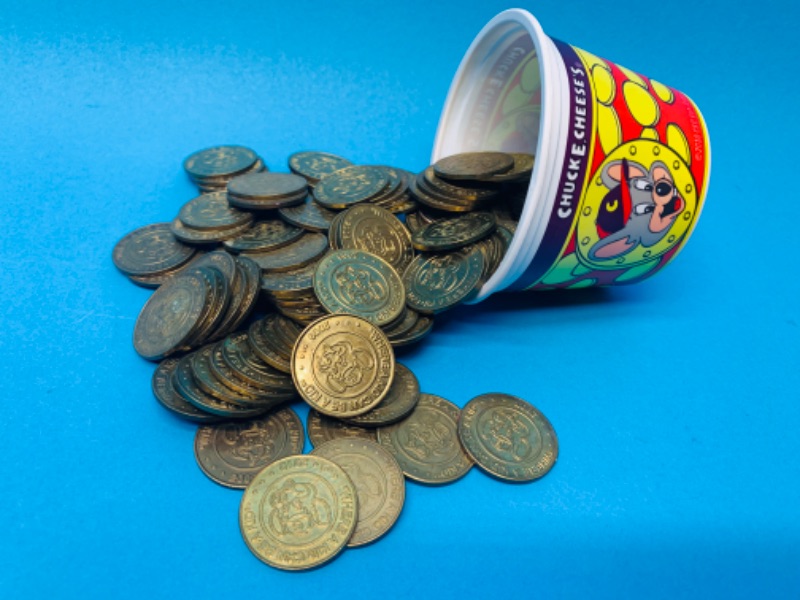 Photo 1 of 803907…small tub of chucky cheese tokens 