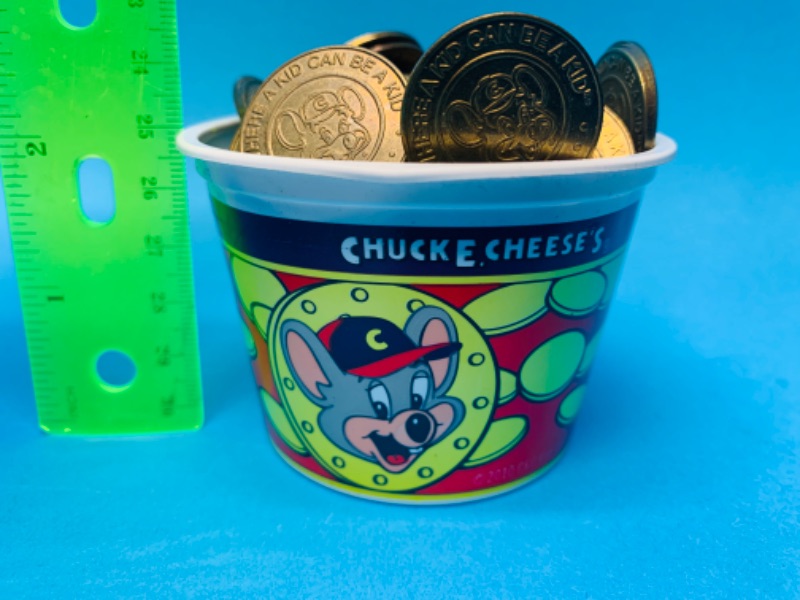 Photo 2 of 803907…small tub of chucky cheese tokens 