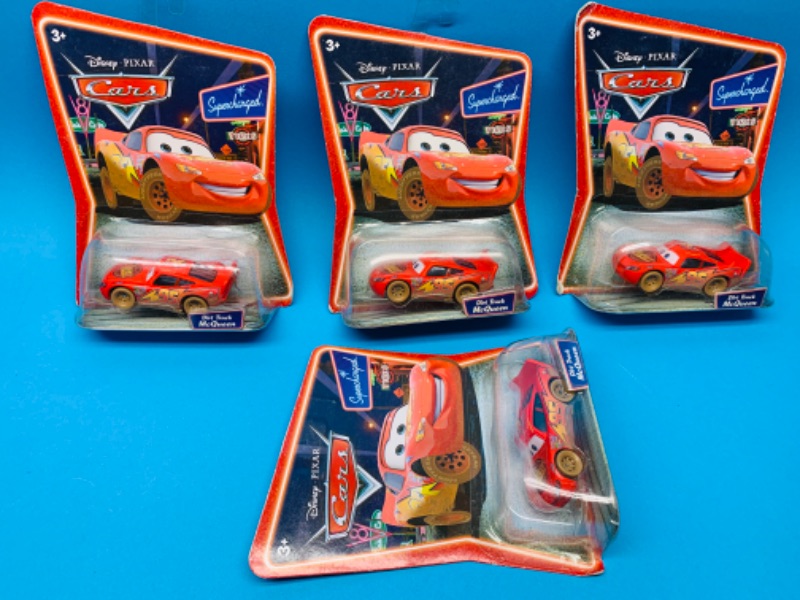 Photo 1 of 803961…4 Disney cars dirt track McQueen cars in original packages- all the same