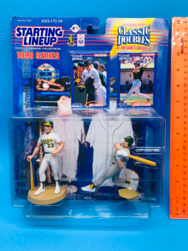 Photo 1 of 803962…starting line up classic doubles Jose Canseco and Mark McGwire figures in original package