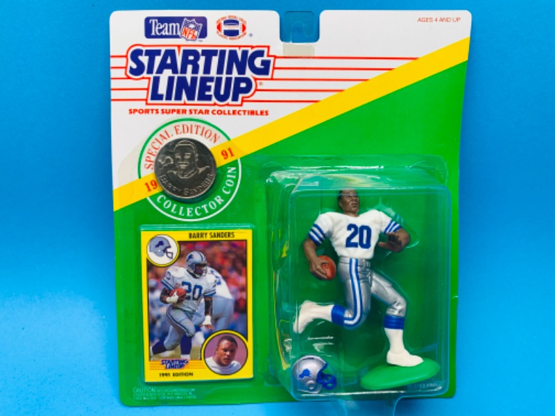 Photo 1 of 803967…starting line up special edition 1991 Barry sanders figure, collector coin, and card  in original package