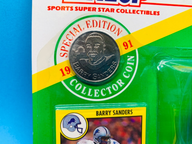 Photo 2 of 803967…starting line up special edition 1991 Barry sanders figure, collector coin, and card  in original package