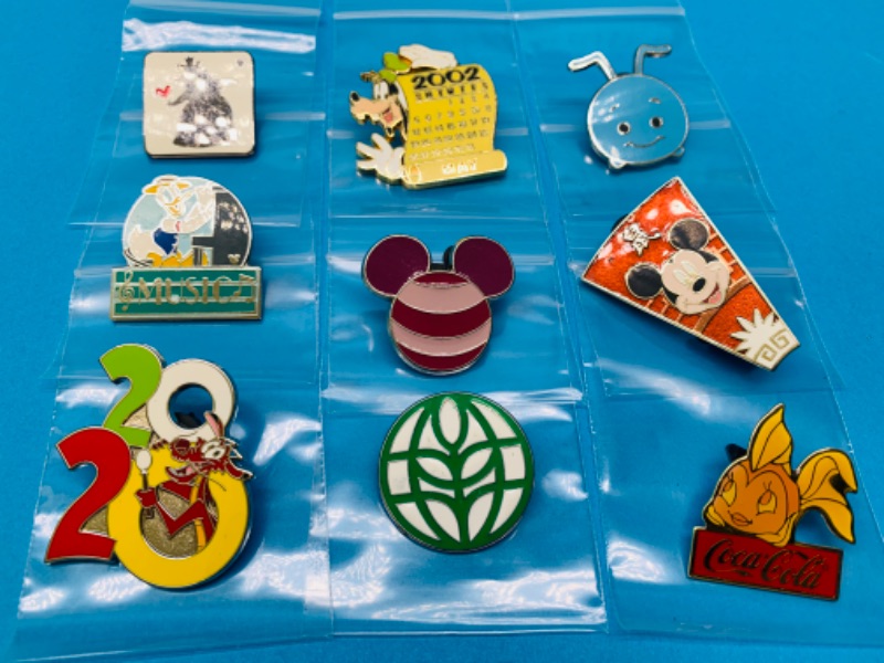 Photo 1 of 803977…9 Disney pins in plastic bags 