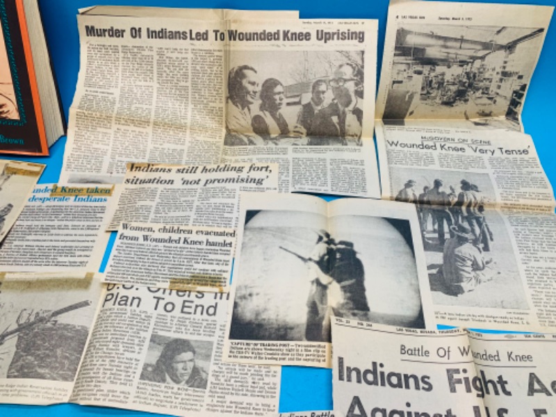 Photo 2 of 804228…vintage wounded knee newspaper clippings and book 