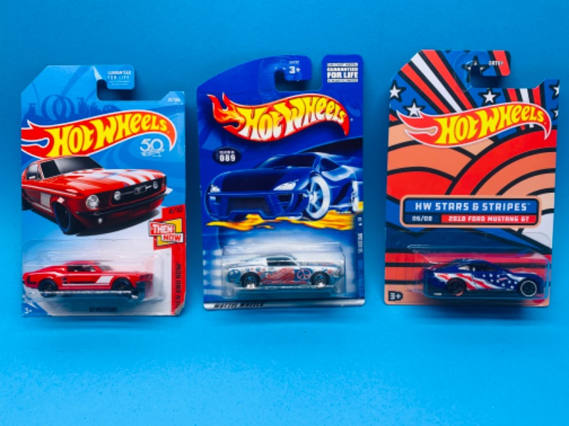 Photo 1 of 804292…Ford Mustang hot wheels die cast cars in original packages 