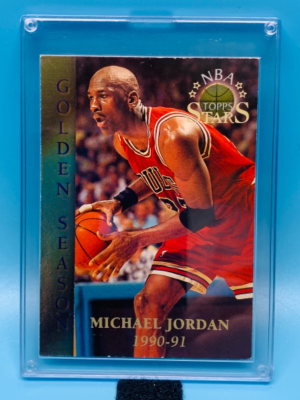 Photo 1 of 804297…topps golden season Michael Jordan card 74 in hard plastic case 