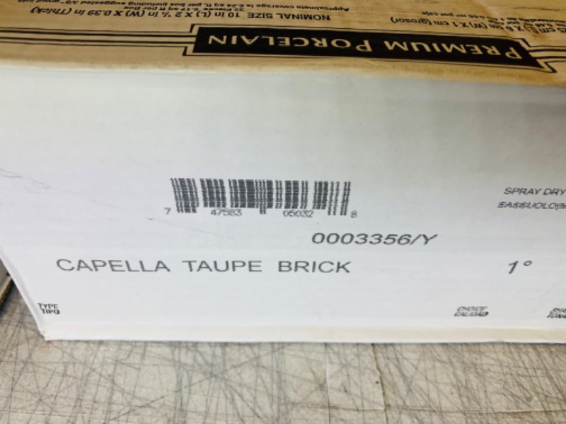 Photo 2 of 804348…12 boxes of premium porcelain tile. 10 inch x 2 1/2 inch. Capella toupe brick color. 32 pieces per box 6.24 square feet per box 74.88 total square feet 