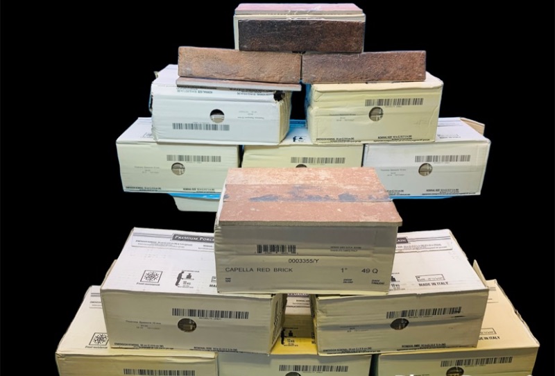 Photo 1 of 804349… 12 boxes of premium porcelain tile. 10 inch x 2 1/2 inch. Capella red brick color. 32 pieces per box 6.24 square feet per box 74.88 total square feet 