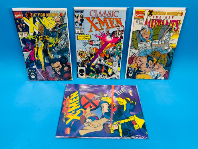 Photo 1 of 804406…X-men comics and activity book in plastic sleeves 