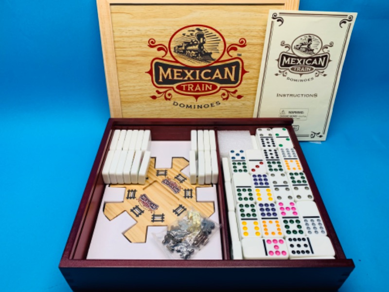 Photo 1 of 804419…Mexican train dominoes set in wood case 