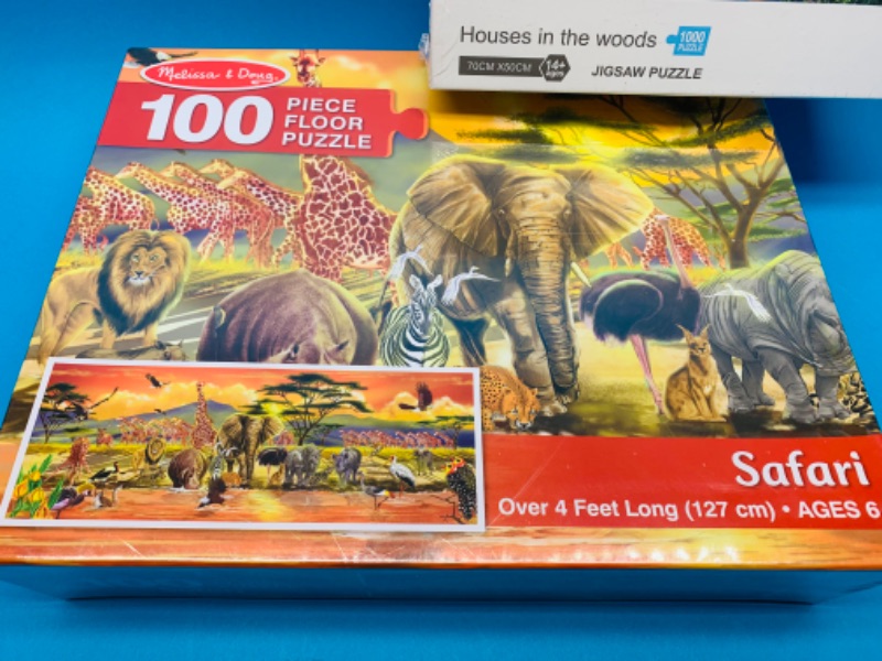 Photo 2 of 804428…2 sealed puzzles- one over 4 feet long