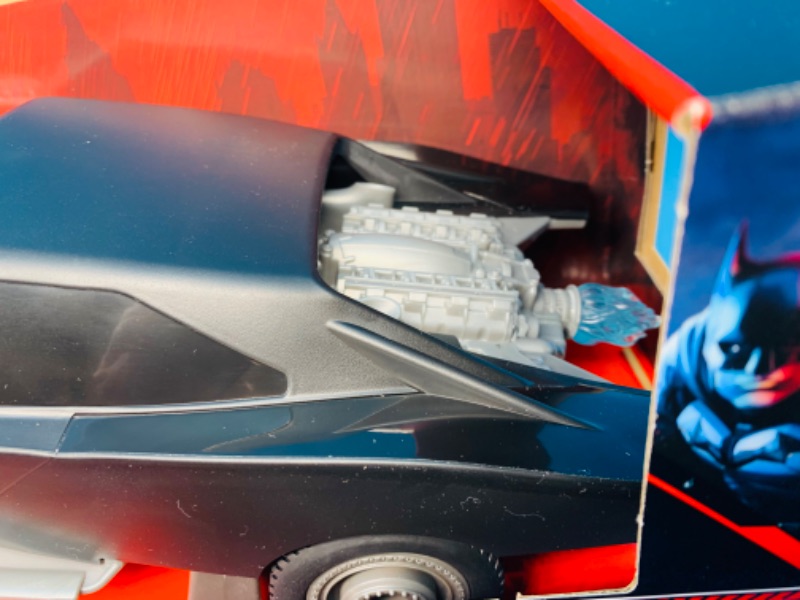 Photo 1 of 804439… Batman remote control turbo boost batmobile with wheelie action, light-up engine,and USB in original box