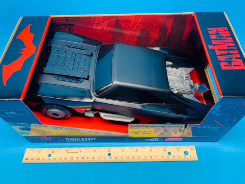 Photo 1 of 804439… Batman remote control turbo boost batmobile with wheelie action, light-up engine,and USB in original box