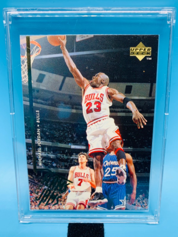 Photo 1 of 804444… upper deck Michael Jordan slams and dunks card 352 in hard plastic case