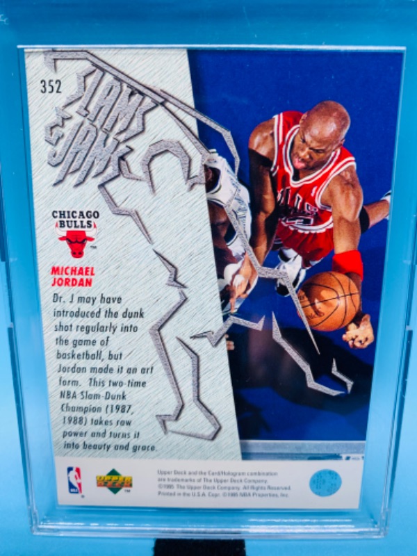 Photo 2 of 804444… upper deck Michael Jordan slams and dunks card 352 in hard plastic case