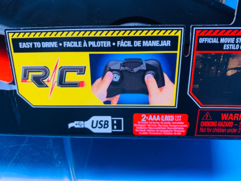 Photo 1 of 804475… Batman remote control turbo boost batmobile with wheelie action, light-up engine,and USB in original box