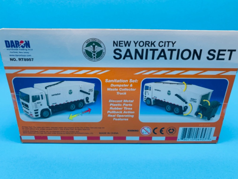 Photo 2 of 804492…Daron die cast pullback and go sanitation truck in box 