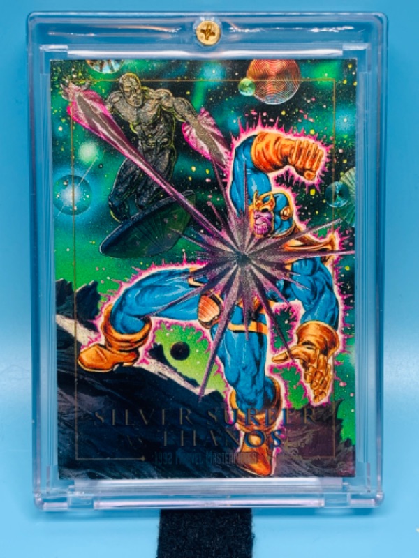 Photo 1 of 804548…1992 Marvel masterpieces silver surfer versus Thanos foil card 2-D in hard plastic case