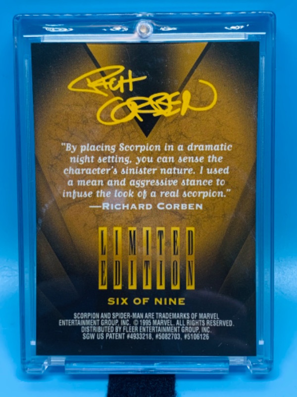 Photo 1 of 804549…fleer ultra Spider-Man golden web scorpion limited edition card 6 by Richard Corben in hard plastic case