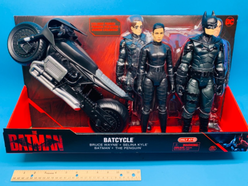 Photo 1 of 804555… the Batman Xlarge batcycle and four 12” action figures in original package 