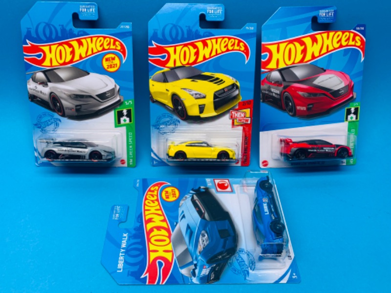 Photo 1 of 804628…4 hot wheels die cast Nissan cars in original packages 