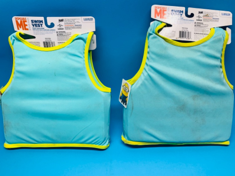 Photo 2 of 804940…2 minions life vests ages 4-6 - new but dirty 