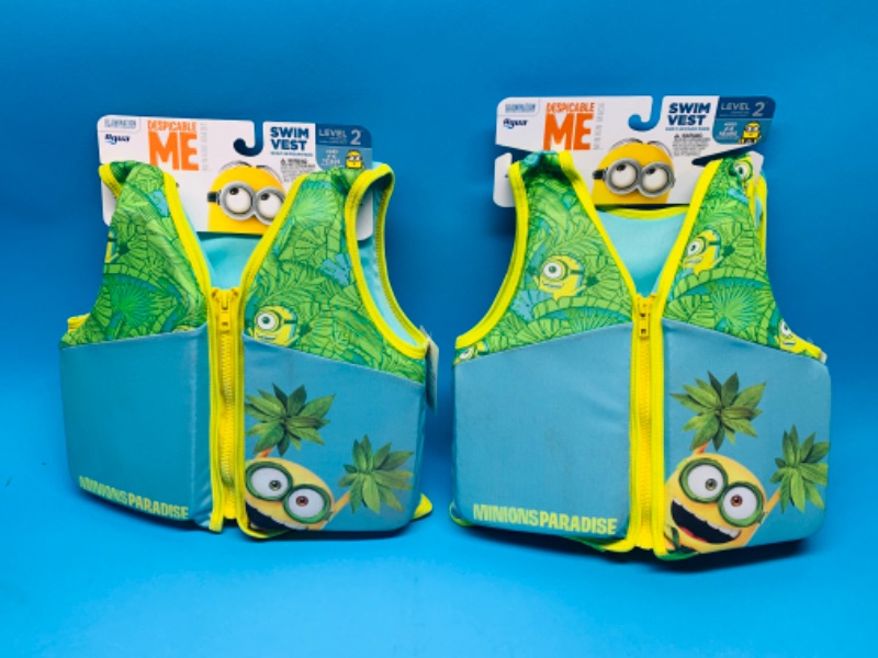 Photo 1 of 804940…2 minions life vests ages 4-6 - new but dirty 