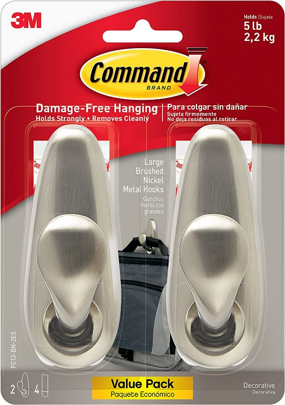 Photo 1 of Command Forever Classic Large Metal Wall Hooks, Damage Free Hanging Wall Hooks with Adhesive Strips, No Tools Double Wall Hooks for Hanging Christmas Decorations, 2 Metal Hooks and 4 Command Strips NEW 