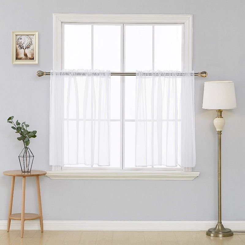 Photo 1 of  Deconovo White Sheer Curtains 54 Inch Length Rod Pocket Voile Drape Curtains for Bedroom 2 Panels 52x54 Inch