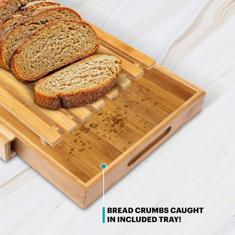 Photo 2 of Ivation Bread Cutting Board Server with  Stainless Steel Bread Knife | Compact Bamboo Wood Slicing Tray & Server, Integrated Knife Slot, Built-In Handles & Crumb Catcher