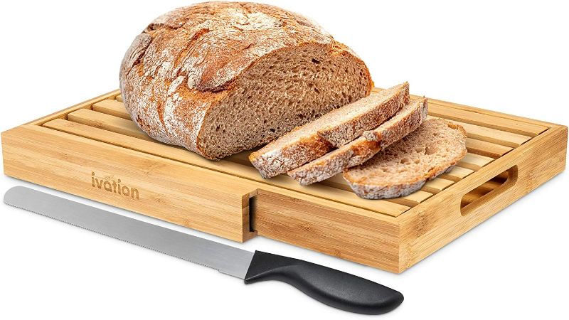 Photo 1 of Ivation Bread Cutting Board Server with  Stainless Steel Bread Knife | Compact Bamboo Wood Slicing Tray & Server, Integrated Knife Slot, Built-In Handles & Crumb Catcher